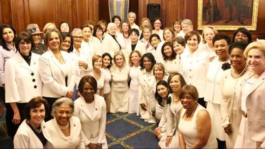 deeds not words cross stitch democratic women wearing white