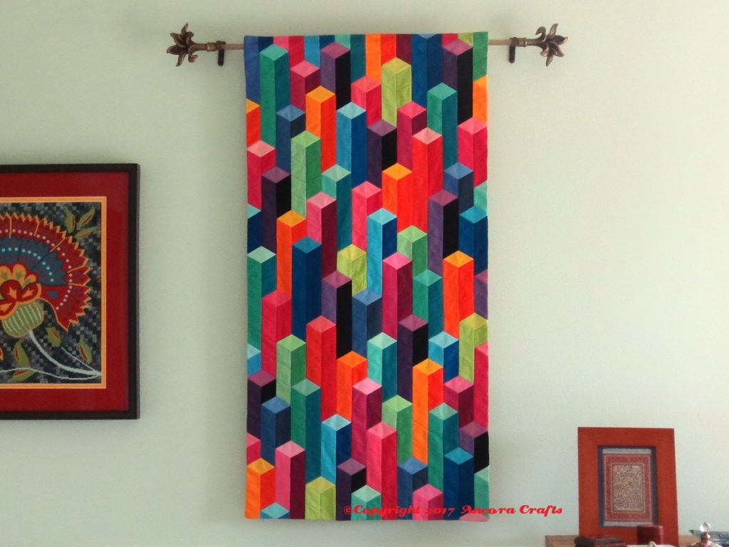 modern tumbling blocks quilt at home