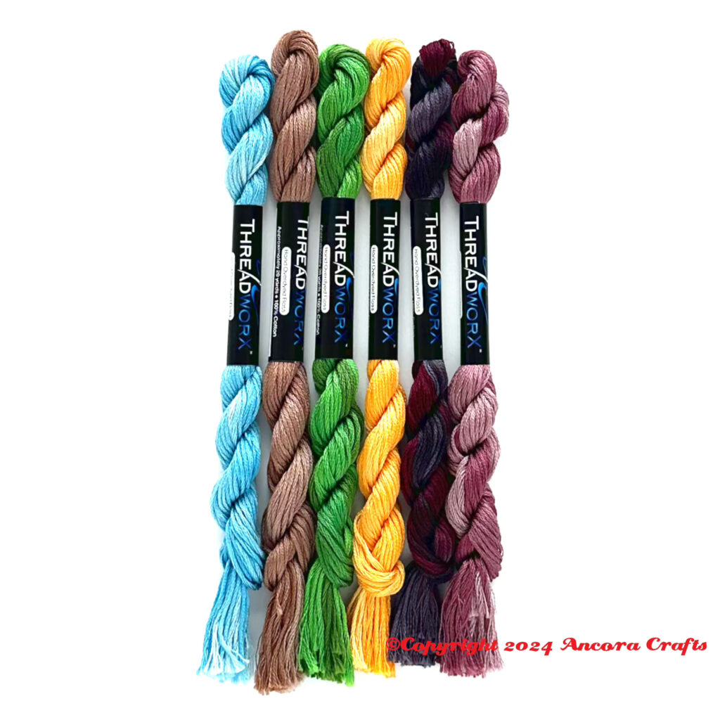 threadworx new floss colors 2023, including a blue, brown, green, yellow, dark gray and red, and a purple