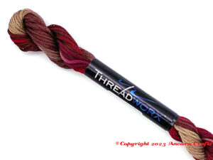 ThreadworX 10372 Kaleb's Cherry Patch variegated embroidery floss is a fun mix of cherry reds, dark brown, and medium ecru 